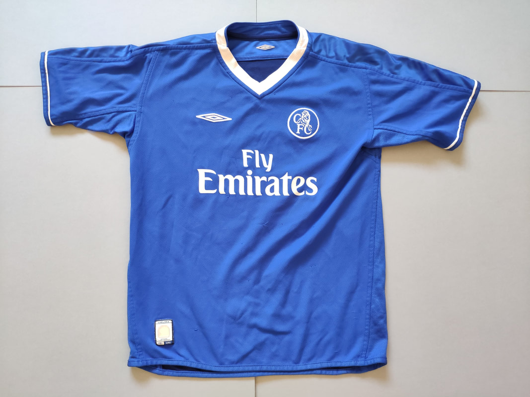 Chelsea F.C. Home 2003/2004 Football Shirt Manufactured By Umbro. The shirt was sponsored by Fly Emirates.