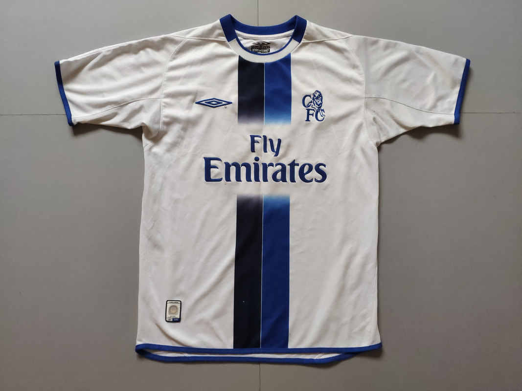 Chelsea F.C. Away 2003/2004 Football Shirt Manufactured By Umbro. The shirt was sponsored by Fly Emirates.
