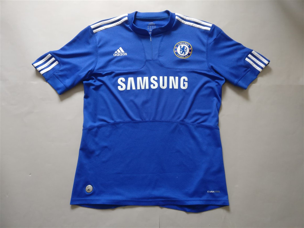 Chelsea F.C. Home 2009/2010 Football Shirt Manufactured By Adidas. The Club Plays Football In England.