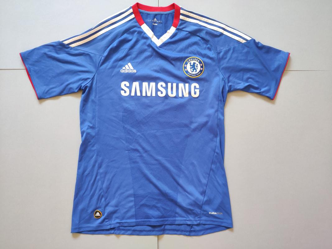 Chelsea F.C. Home 2010/2011 Football Shirt Manufactured By Adidas. The Club Plays Football In England.