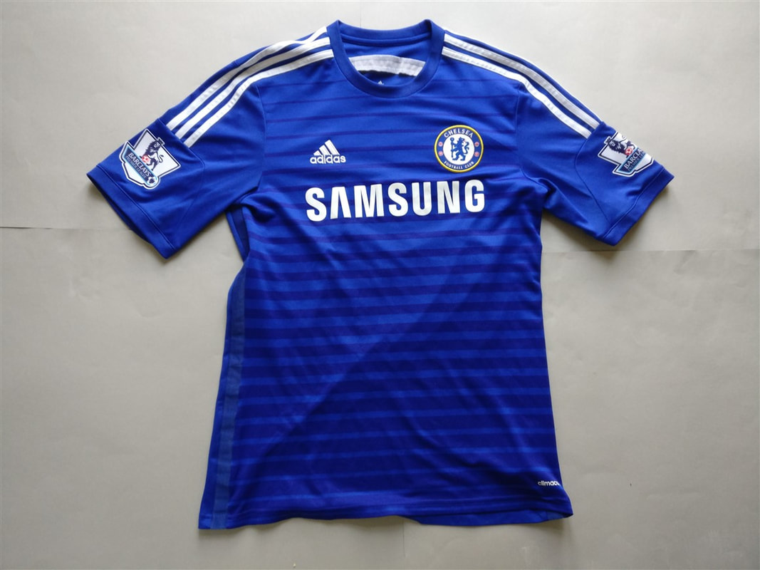 Chelsea F.C. Home 2014/2015 Football Shirt Manufactured By Adidas. The Club Plays Football In England.