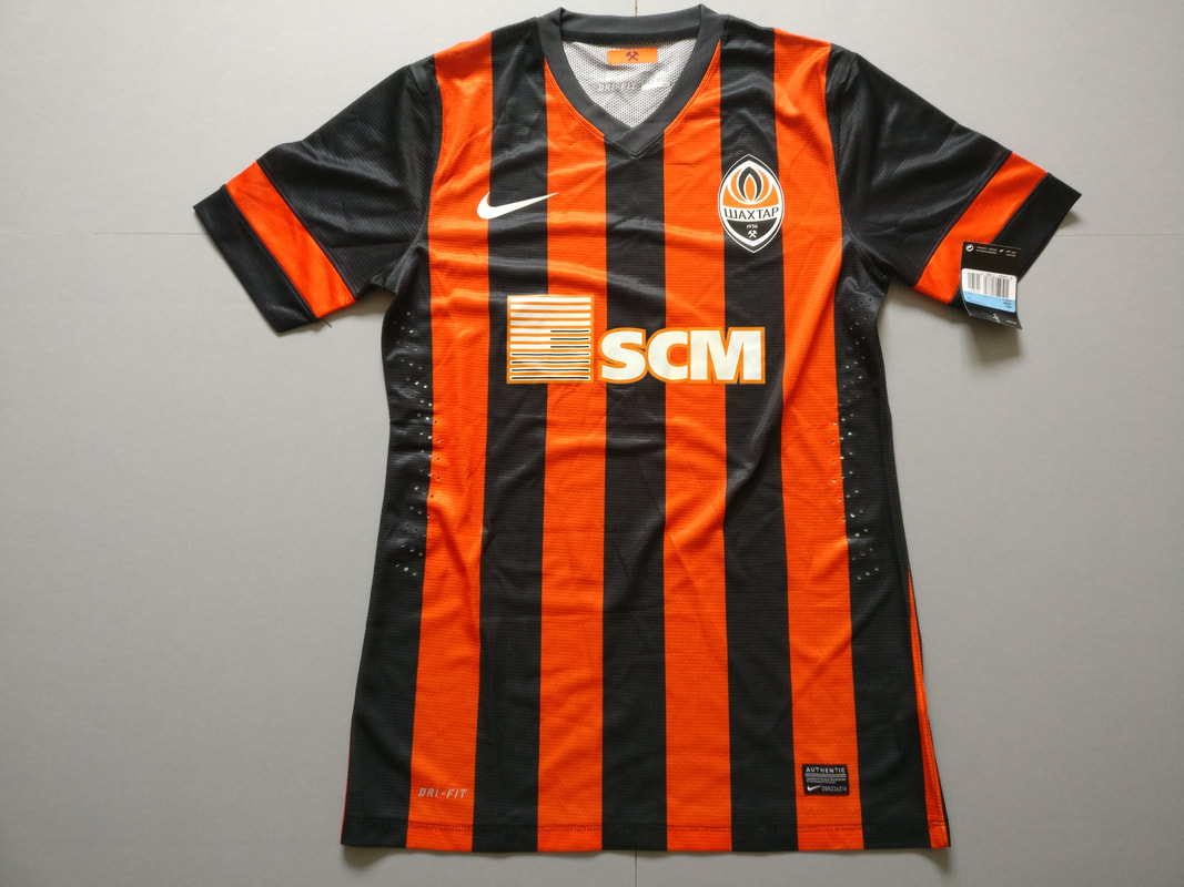 FC Shakhtar Donetsk Home 2013/2015 Football Shirt Manufactured By Nike. The Club Plays Football In Ukraine.