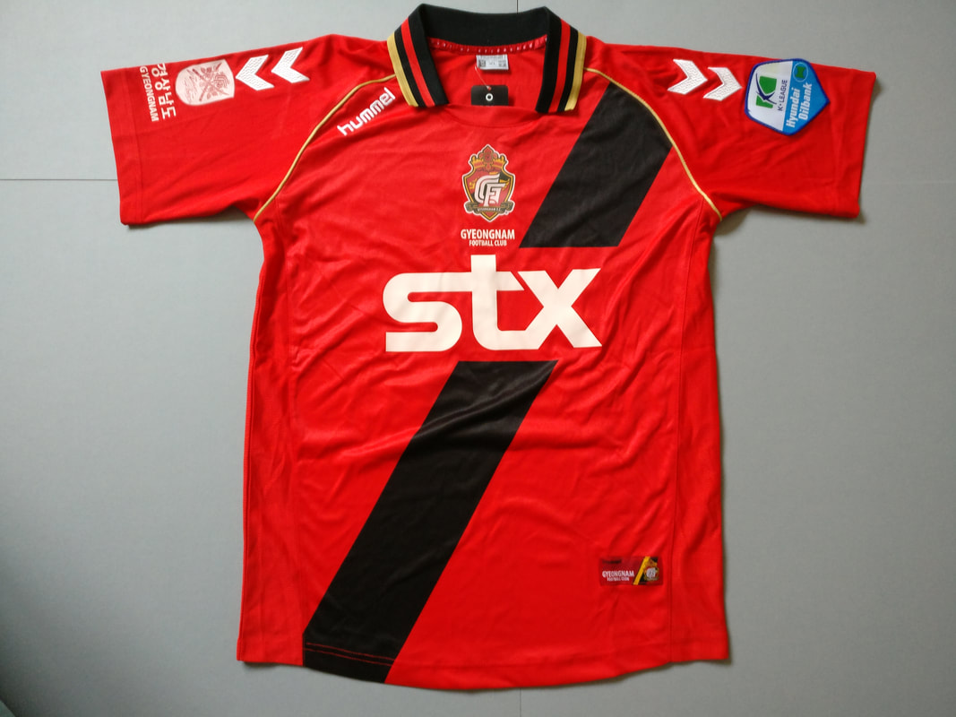Gyeongnam FC Home 2012 Football Shirt Manufactured By Hummel. The Team Plays Football In South Korea.
