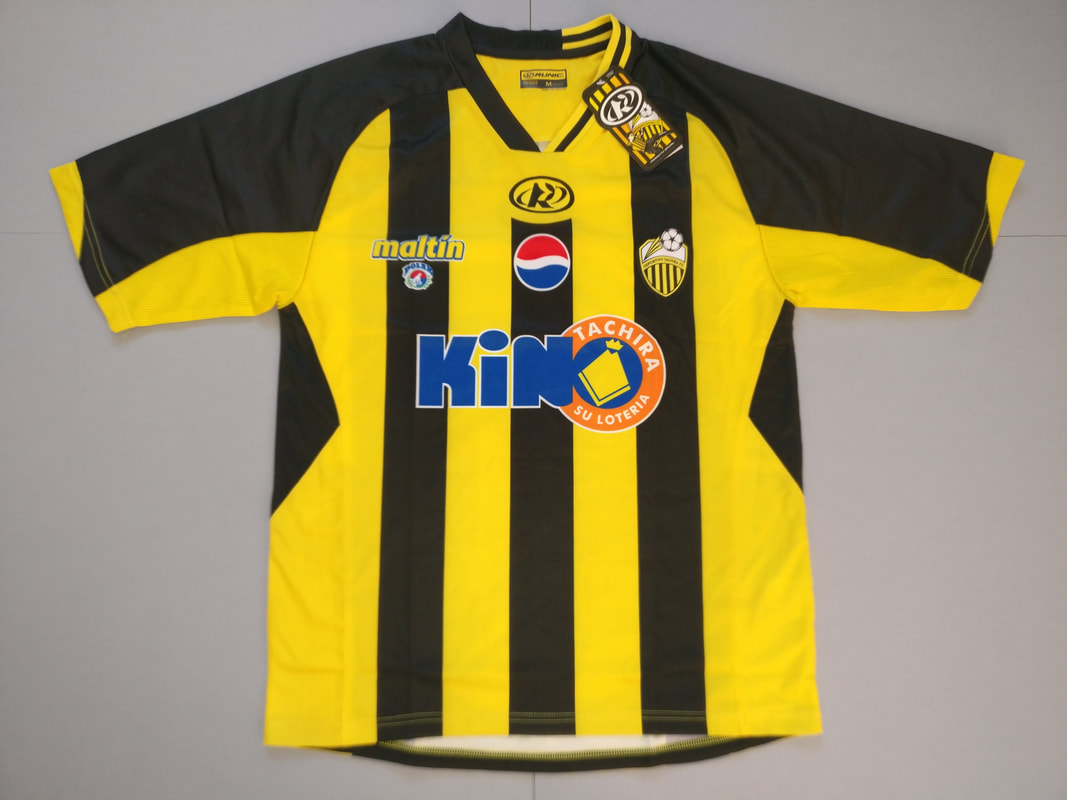 Deportivo Táchira F.C. Home 2010/2011 Football Shirt Manufactured By Runic. The Club Plays Football In Venezuela.