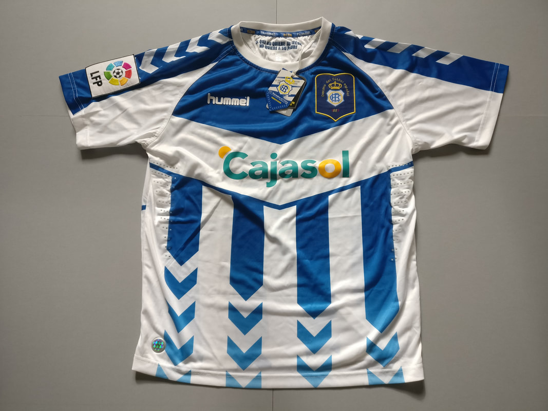 Recreativo de Huelva Home 2012/2013 Football Shirt Manufactured By Hummel. The Club Plays Football In Spain.