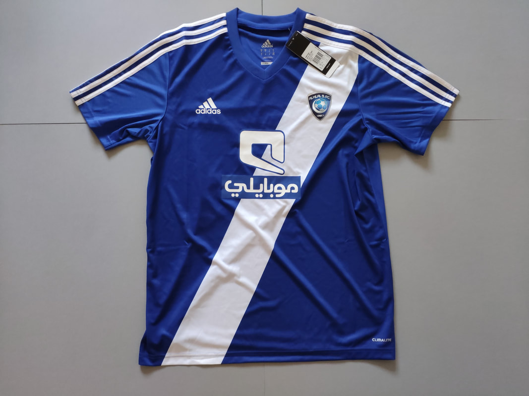 Al-Hilal Home 2012/2013 Football Shirt Manufactured By Adidas. The Team Plays Football In Saudi Arabia.