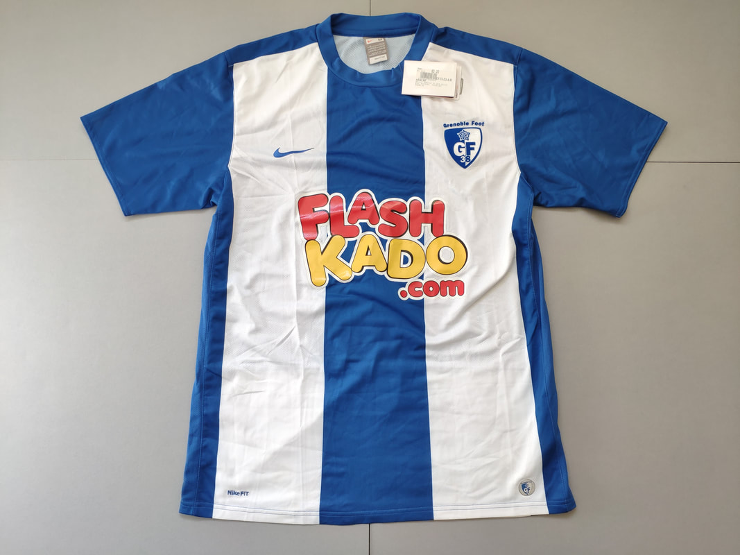 Grenoble Foot 38 Home 2009/2010 Football Shirt Manufactured By Nike. The Club Plays Football In France.