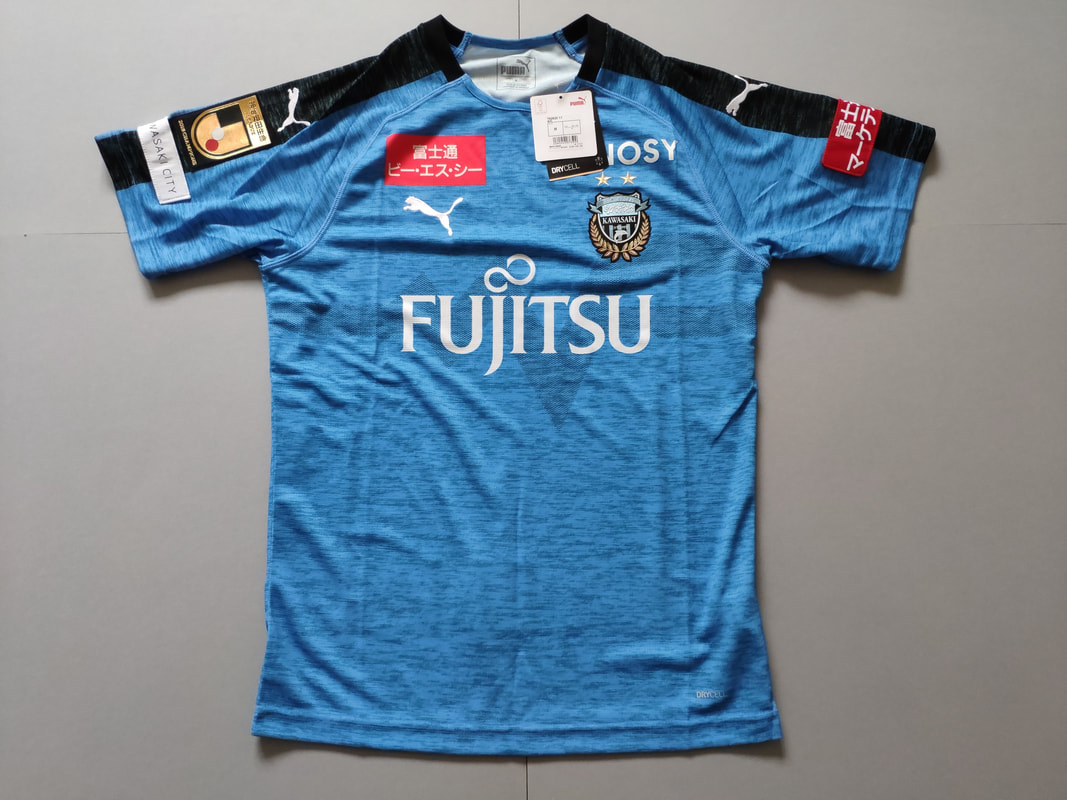 Kawasaki Frontale Home 2019 Football Shirt Manufactured By Puma. The Club Plays Football In Japan.