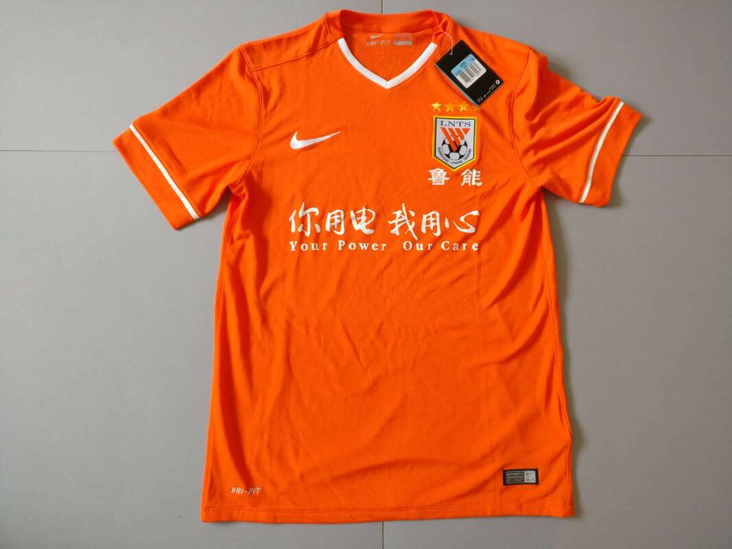 Shandong Luneng Taishan F.C. Home 2015 Football Shirt Manufactured By Nike. The Team Plays Football In China.